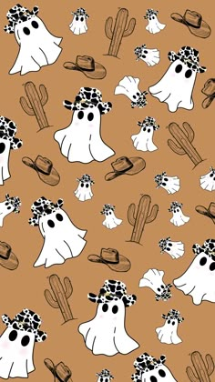 a pattern with white ghost and cactuses on an orange background that has black dots