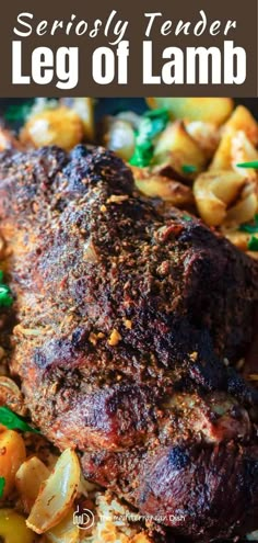 a close up of a plate of food with lamb chops and vegetables on it