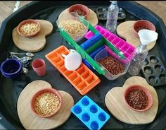 the tray is filled with different types of food and utensils for making treats