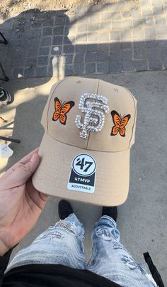 Tan Custom butterfly/ rhinestone SF Giants Adjustable Hat Custom one of one‼️ Casual Snapback Baseball Cap With Rhinestones, Casual Rhinestone Snapback Hat, Usher Concert, Custom Fitted Hats, Streetwear Hats, Dope Hats, Hat Aesthetic, Butterfly Rhinestone, Redwood City