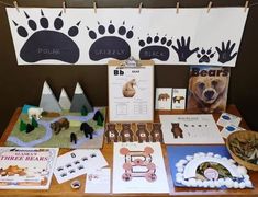 there are many different animal crafts on the table with pictures and cards to make them look like animals