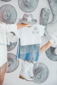 How cute is our MINI KIDS DISCO COWGIRL DENIM SKIRT!All orders are currently shipping within 14 business days. To receive item quicker, expedited shipping is available at checkout. Denim Disco Cowgirl, Glitter Skirt Cowgirl, Glitter Cowgirl Aesthetic, Sequin Skirt Cowgirl, Sequined Mini Disco Skirt, Space Cowgirl Coats & Jackets, Fringe Tee, Space Cowgirl, Boot Bling