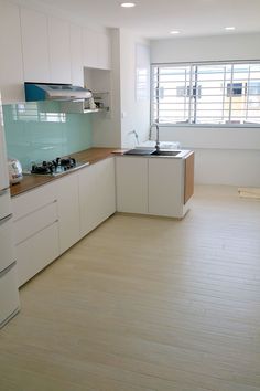 the kitchen is clean and ready for us to use in its new owner's home