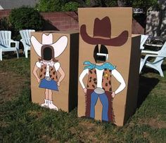 two cardboard boxes decorated with cowboy costumes