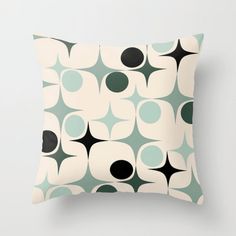 a pillow with black and white circles on it