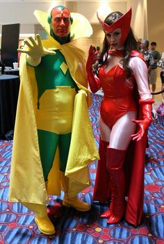 two people in costumes standing next to each other