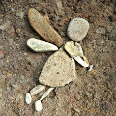 some rocks are laying on the ground and there is no image here to provide a caption for