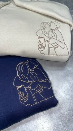 two zippered pouches sitting next to each other