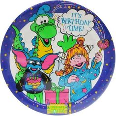 a birthday plate with an image of two cartoon characters on the front and one is holding a