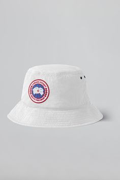 Designed  for  all-day  wear and sun protection, the Haven Bucket hat has you covered from all angles. Crafted from our Dura-Force Light for breathability and comfort. It features an adjustable cord lock for adaptability, reflective tape for low light visibility, and our signature Arctic Disc logo. Reflective Tape, North Star, Low Light, Canada Goose, Sun Protection, Bucket Hat, Force, Sun, Hats