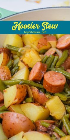 a close up of food in a bowl with potatoes and green beans on the side