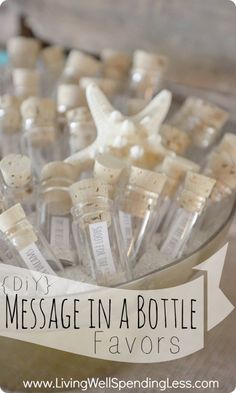 there is a bowl full of wine bottles with message in the bottle for favors on it