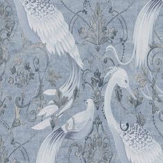 two white birds standing next to each other on a blue wallpapered background with floral designs