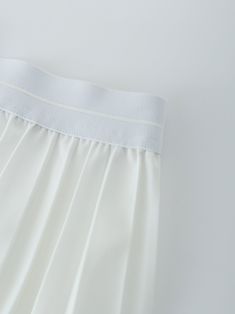 Our best selling Pleated skirt is back in all new colors! This easy to wear skirt can be dressed up or down, depending on the occasion, and is a must-have for your wardrobe. White Stretch Tiered Mini Skirt, White Skirted Skort With Elastic Waistband, White Tiered Skort With Elastic Waistband, White Tennis Skirt With Elastic Waistband For Spring, White Tiered Skort, White Flowy Tiered Tennis Skirt, White Tiered Mini Skirt With Elastic Waistband, Chic White Stretch Tennis Skirt, White Tiered Lined Skort