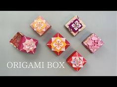 four origami boxes sitting on top of each other with the words origami box above them