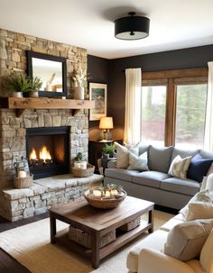 a living room filled with furniture and a fire place in front of a stone fireplace