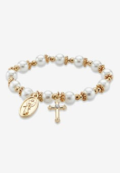 This religious charm bracelet glows heavenly with a golden cross and angel charms, lustrous pearls and golden beads on a stretch band. This simulated pearl beauty is a beautiful expression of your faith. 7" length. Gold tone.FABRIC: GoldtoneMain Stone: 13 Round Simulated Pearls, 8 mm x 8 mm1 Round Faceted Cut Crystal, 2.5 mm x 2.5 mmDimensions: 8 mm wide x 7 inches long x 8 mm highIncludes gift box and drawstring pouch | Women's Round Simulated Pearl And Beaded Religious Stretch Bracelet In Gold Angel Charms, Golden Cross, Golden Beads, Beads Bracelet Design, Stretch Band, Gemstone Beaded Bracelets, Christian Jewelry, Cross Bracelet, Cross Jewelry