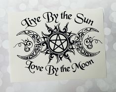 a sticker with the words love by the moon on it