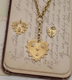 18K Yellow Gold Custom Radiating Heart : Medium Medallion – FoundRae Heart-shaped Promise Jewelry With Initials, Pragma Love, Radiating Heart, Playful Love, Diamond Letters, Block Letters, Gold Medallion, Love Token, Block Lettering