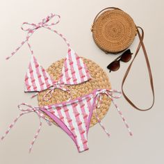 Welcome to Sand and Sun Vibe by LR. We design unique apparel that you will not find in stores.  Our  Coquette Cherry Pink Striped Swimwear is Perfect for your next vacation, beach outing, or pool party! Makes a perfect gift for her.  Item Details: * Soft and stretchy material with UPF 50+ * Sizes up to 6XL * Bikini top comes with removable padding for comfort * Multiple ways to tie and style the bikini set * Color design options for swimwear lining Please visit store for child matching swimwear and matching beach accessories Disclaimers:  * Due to the 2-layered construction and internal stitching, a visible stitch may appear in the crotch seam of the bikini bottom. This is a normal part of the manufacturing process and does not impact the quality or performance of the product. * To make yo Adjustable Tankini For Beach Party Season, Adjustable Tankini For Beach Vacation, Adjustable Beachwear Tankini For Vacation, Playful Pink Adjustable Swimwear, Playful Pink Swimwear For Beach Party, Playful Triangle Top Swimwear For Beach Party, Playful Triangle Top Tankini For Vacation, Adjustable Swimwear For Beach Party Season, Pink Printed Swimwear For Beachwear