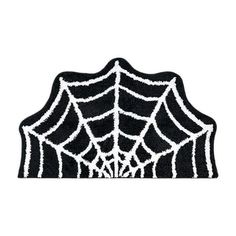 a black and white spider web rug on a white background with the word halloween written across it