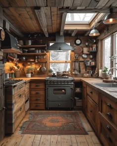 an old fashioned kitchen with wooden floors and walls