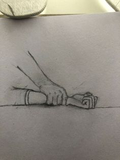 a pencil drawing of two hands holding each other