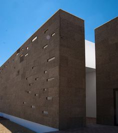 the side of a building that has been designed to look like it is made out of concrete