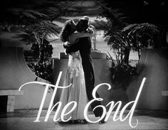 a couple kissing in front of palm trees with the words, the end on it