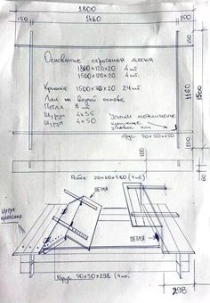 a drawing of a table with an open laptop on it and measurements for the top