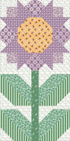 an image of a flower that is in the middle of a quiltwork pattern,