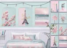 a bedroom decorated in pastel colors with pink flowers on the wall and pictures above the bed