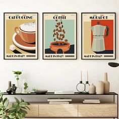 three coffee posters are hanging on the wall above a table with vases and other items