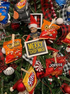 a christmas tree decorated with candy and other decorations