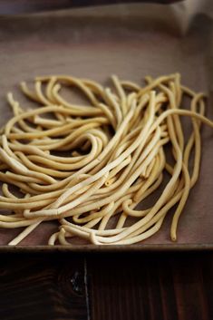 the noodles are ready to be cooked in the oven on the tray for servings