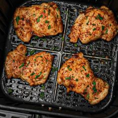 four pieces of chicken in an air fryer