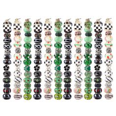 a collection of bracelets with different designs and colors on each bead, all lined up against a white background