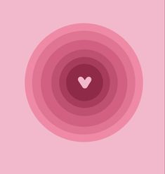 a pink circle with a white heart in the center