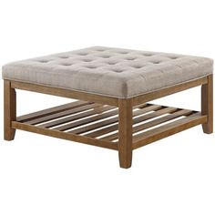 a square footstool with a wooden slatted bottom and beige upholstered cushion