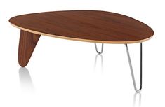 an oval wooden table with metal legs and a wood top, viewed from the side