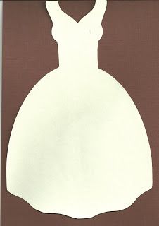 a paper cutout of a white dress on a brown background with the silhouette of a woman's dress