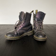 "VINTAGE :: Rare 90s Y2K Dr Martens Metallic Leather Lace Up Boots  COLOUR :: Purple Metallic  FIT/TAG :: UK3 / AU5  MATERIAL :: Leather / Rubber  CONDITION :: Good   MEASUREMENTS :: TBA Total Foot Length Outer - cm // 9.5\"  Total Foot Length Inner - cm // 8.75-9\"  Width at widest point - cm // 3.5\"  Total Height of Boot - cm // 7.5\"   DETAILS :: Authentic Dr Martens in good vintage condition, cushion souls & rainbow laces, few scuffs but minimal wear & tear. Womens UK3/US5/AU5.   NOTE :: Each hand selected vintage or preloved piece is a one-of-a-kind item & can only be purchased by a single customer. Measurements are in cm/inches lying flat (double width for circumference).  POLICY :: Any major details, features or flaws will be described. Please ask any questions prior to purchases. Rainbow Laces, Purple Metallic, Leather Lace Up Boots, Leather Lace, Metallic Leather, Dr. Martens, Boot Shoes Women, Lace Up Boots, Leather And Lace