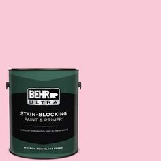 a pink paint with the words behr ultra stain - blocking paint and primer