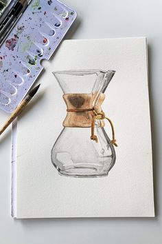 a watercolor painting of a coffee pot on paper next to some paintbrushes