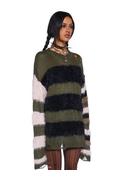 This sweater has a stretchy loose knit yarn construction, fuzzy faux fur detailing, a striped design, distressed detailing, and an oversized fit. Game Dino, Current Mood Clothing, Costume Store, Current Mood, Blue Gingham, Sweater Design, Green Sweater, Oversized Sweater, Long Cardigan