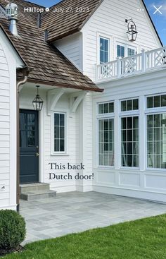 a white house with the words this back dutch door