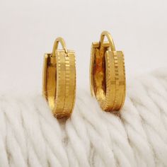 Please click -- Learn more about this item -- below for a full description 22k gold earrings handmade jewelry made in India weight is 2.85 grams approx. length is 1.7 centimeter approx. width is 1.3 centimeter and 4 mm approx. please message me if you want real gold screw/backs. Handmade 14k Yellow Gold Huggie Earrings, Hoop Earrings Gold Indian, 22k Yellow Gold Hoop Earrings For Formal Occasions, Formal 22k Yellow Gold Hoop Earrings, 22k Gold Hallmarked Hoop Earrings For Anniversary, 22k Gold Small Hoop Earrings, 22k Yellow Gold Huggie Earrings As Gift, 22k Yellow Gold Hoop Earrings For Anniversary, 22k Gold Hoop Earrings As A Gift