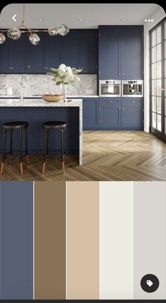 a kitchen with blue cabinets and wooden floors