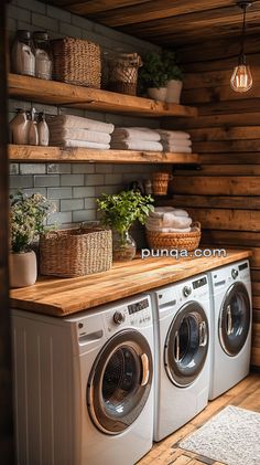 a washer and dryer in a room with wooden shelves on the wall next to each other