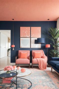 a living room with blue walls and pink furniture